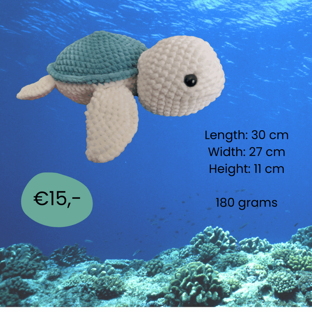 Crocheted turtle in white and blue