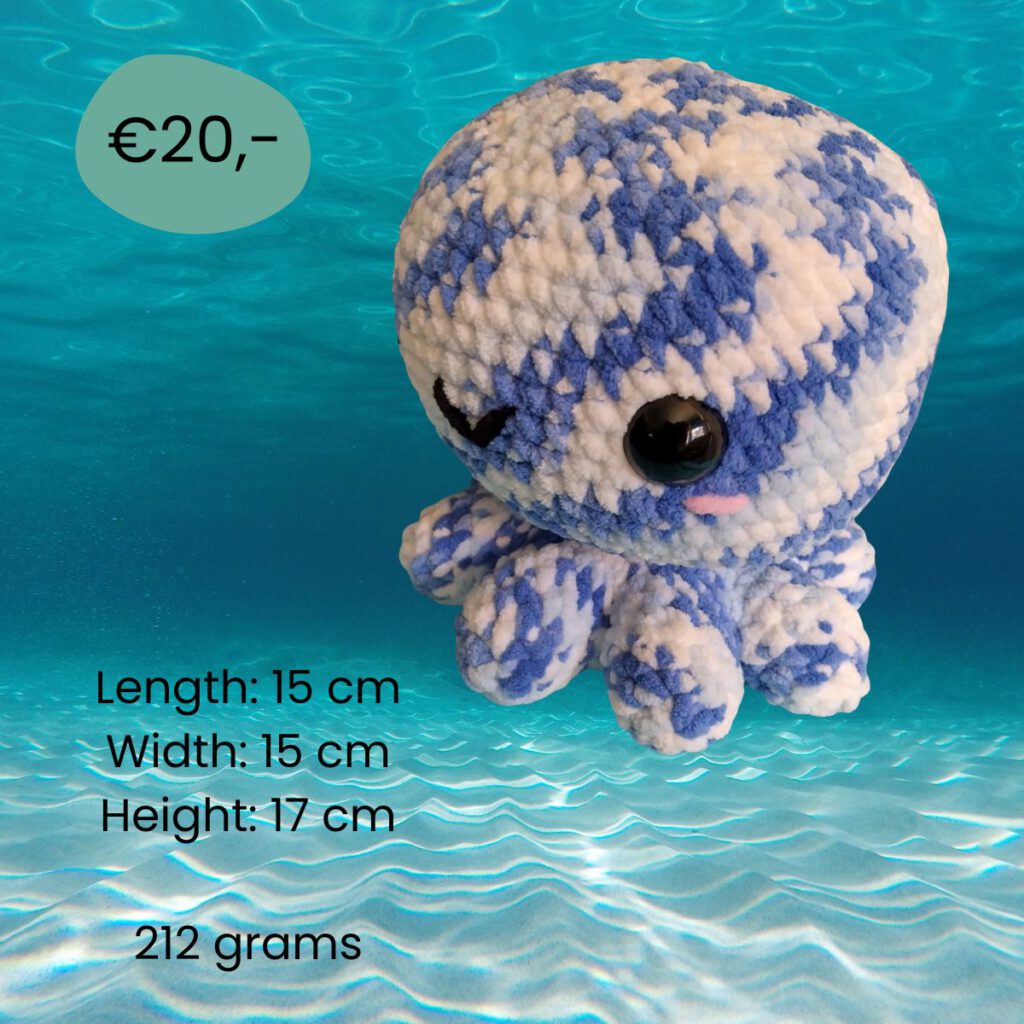 Crocheted octopus in blue and white